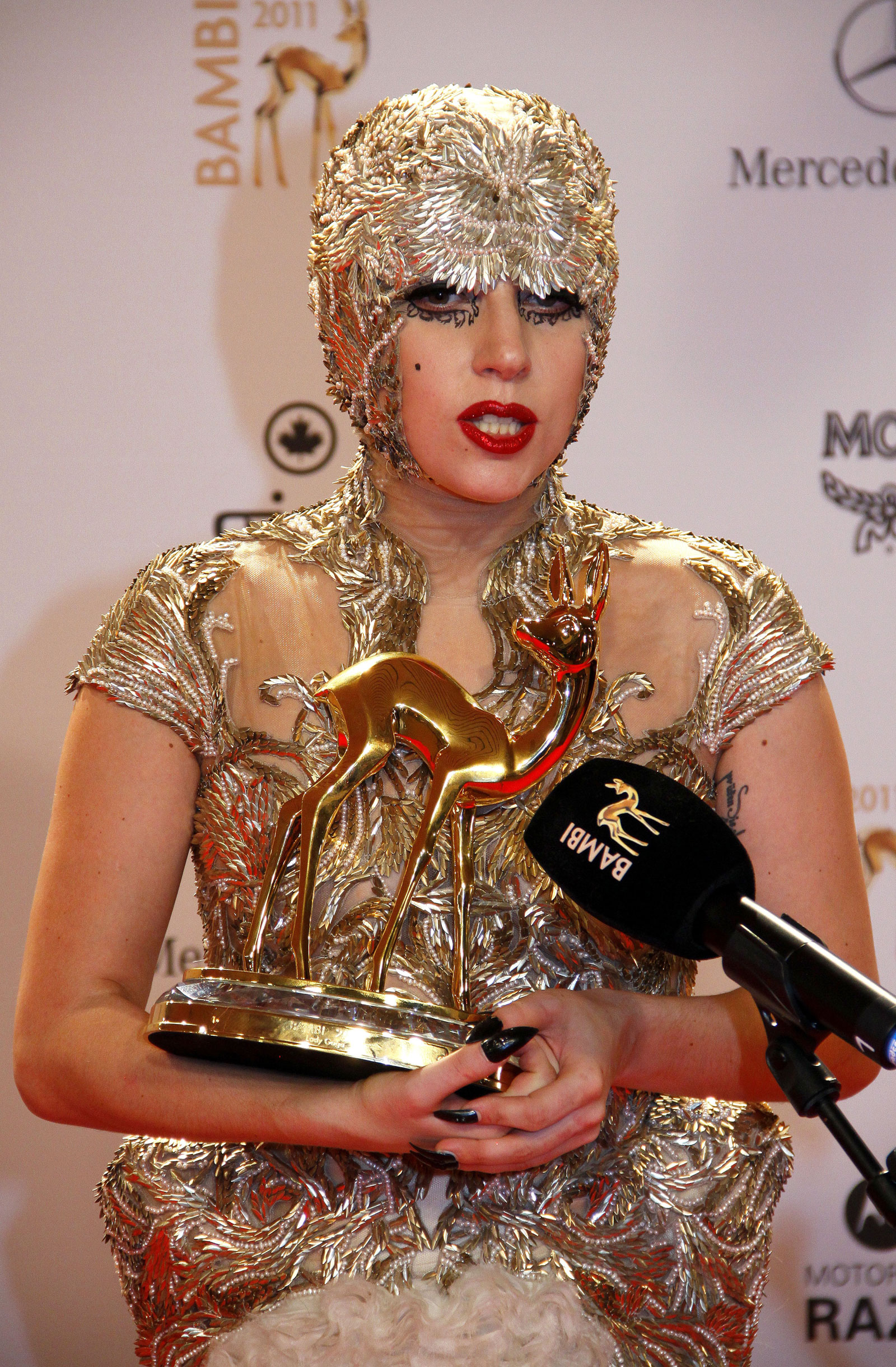Lady-Gaga-in-Gold-Alexander-McQueen-At-T