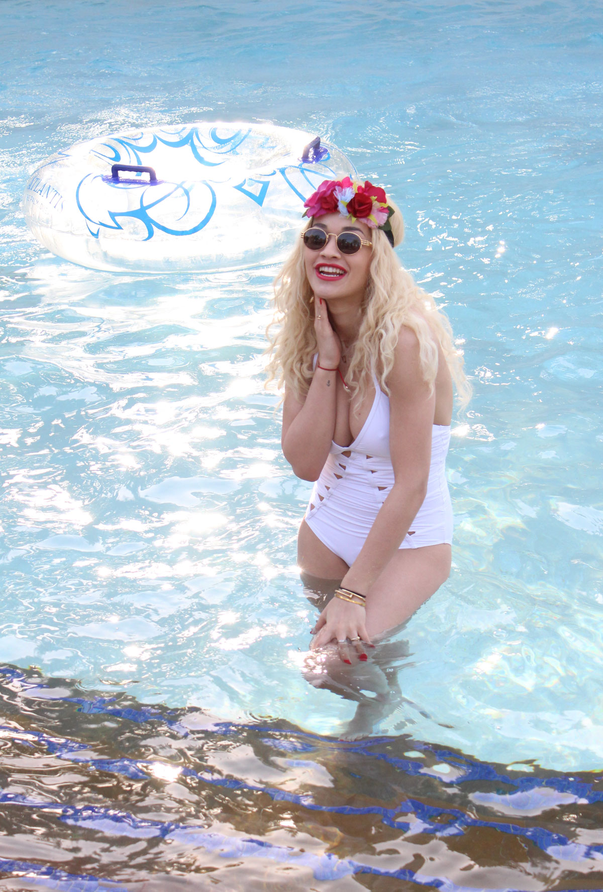 Rita Ora In White Swimsuit In a Swimming Pool in Dubai