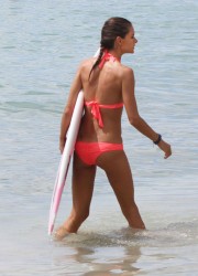 Alessandra Ambrosio Paddleboarding on the Beach