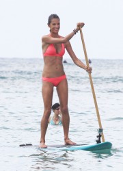 Alessandra Ambrosio Paddleboarding on the Beach