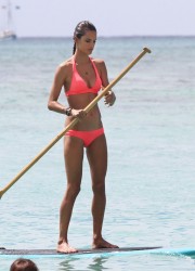 Alessandra Ambrosio Paddleboarding on the Beach