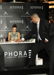 Kim Kardashian Signs Autographs