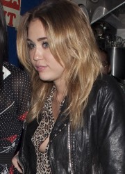 Miley Cyrus at The Little Door Restaurant