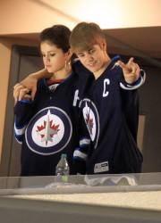 Selena Gomez and Justin Bieber at Winnipeg Jets Hockey Game