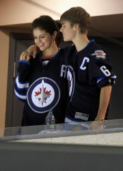 Selena Gomez and Justin Bieber at Winnipeg Jets Hockey Game