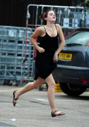Emma Watson Leggy Candids Running in Black Dress
