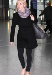 Kate Winslet Arrives at Heathrow Airport