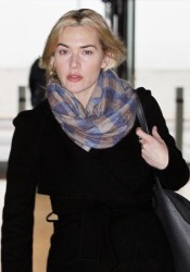 Kate Winslet Arrives at Heathrow Airport