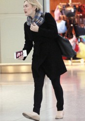 Kate Winslet Arrives at Heathrow Airport