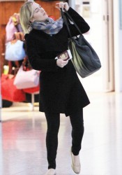 Kate Winslet Arrives at Heathrow Airport