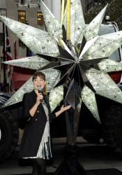 Olivia Wilde Unveils The Swarovski Star In Rockefeller Center