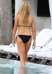 Jill Martin shows of her bikini body in the pool at the Delano Hotel in South Beach