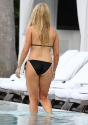Jill Martin shows of her bikini body in the pool at the Delano Hotel in South Beach