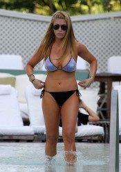 Jill Martin shows of her bikini body in the pool at the Delano Hotel in South Beach