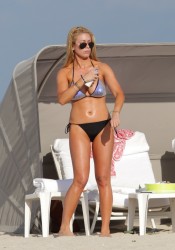 Jill Martin shows of her bikini body in the pool at the Delano Hotel in South Beach