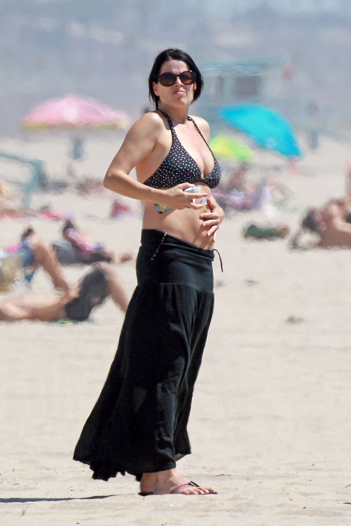 NEVE CAMPBELL in Bikini Top at a Beach in Los Angeles.