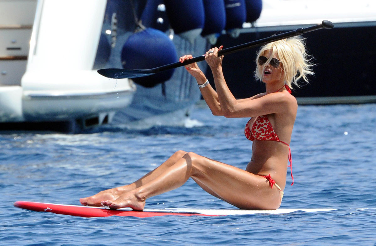 VICTORIA SILVSTEDT in Bikini Paddling in the Sea in Sardinia