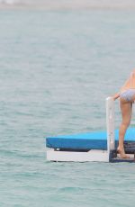 ALICE EVE in Bikini at a Beach in Barbados