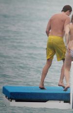 ALICE EVE in Bikini at a Beach in Barbados