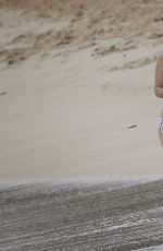 ALICE EVE in Bikini at a Beach in Barbados