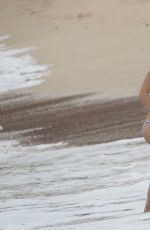 ALICE EVE in Bikini at a Beach in Barbados