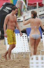 ALICE EVE in Bikini at a Beach in Barbados