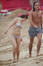 ALICE EVE in Bikini at a Beach in Barbados