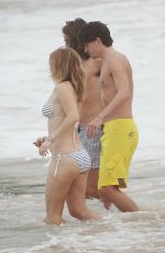 ALICE EVE in Bikini at a Beach in Barbados