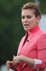 ALYSSA MILANO on the Set of Extra at the Grove in Los Angeles