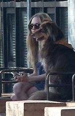 AMANDA SEYFRIED and Finn Out in West Hollywood