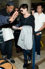 ANNE HATHAWAY at LAX Airport in Los Angeles