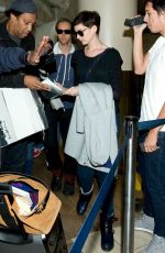 ANNE HATHAWAY at LAX Airport in Los Angeles