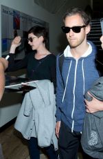 ANNE HATHAWAY at LAX Airport in Los Angeles