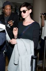 ANNE HATHAWAY at LAX Airport in Los Angeles
