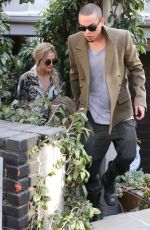ASHLEE SIMPSON Arrives at a Friends House in Hollywood