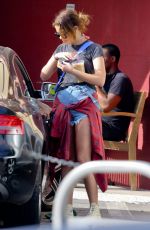 ASHLEY BENSON at the Coffee Bean in West Hollywood