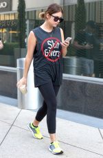 ASHLEY BENSON in Tights Leaves a Gym in West Hollywood