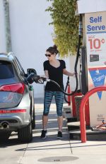 ASHLEY GREENE at a Gas Station in Beverly Hills