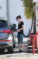 ASHLEY GREENE at a Gas Station in Beverly Hills