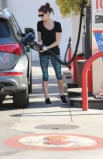 ASHLEY GREENE at a Gas Station in Beverly Hills