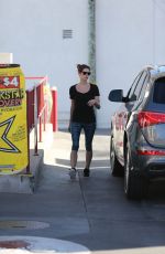 ASHLEY GREENE at a Gas Station in Beverly Hills