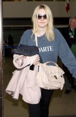 DAKOTA FANNING at LAX Aisport