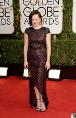 ELISABETH MOSS at 71st Annual Golden Globe Awards