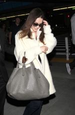 EMILIA CLARKE at LAX Airport in Los Angeles