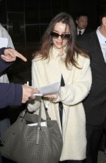 EMILIA CLARKE at LAX Airport in Los Angeles