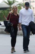 EMILY BLUNT and John Krasinski Leaves the Arclight Cinemas in Los Angeles