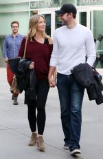 EMILY BLUNT and John Krasinski Leaves the Arclight Cinemas in Los Angeles