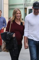 EMILY BLUNT and John Krasinski Leaves the Arclight Cinemas in Los Angeles