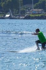 EMMA STONE Surfing in Hawaii