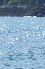 EMMA STONE Surfing in Hawaii